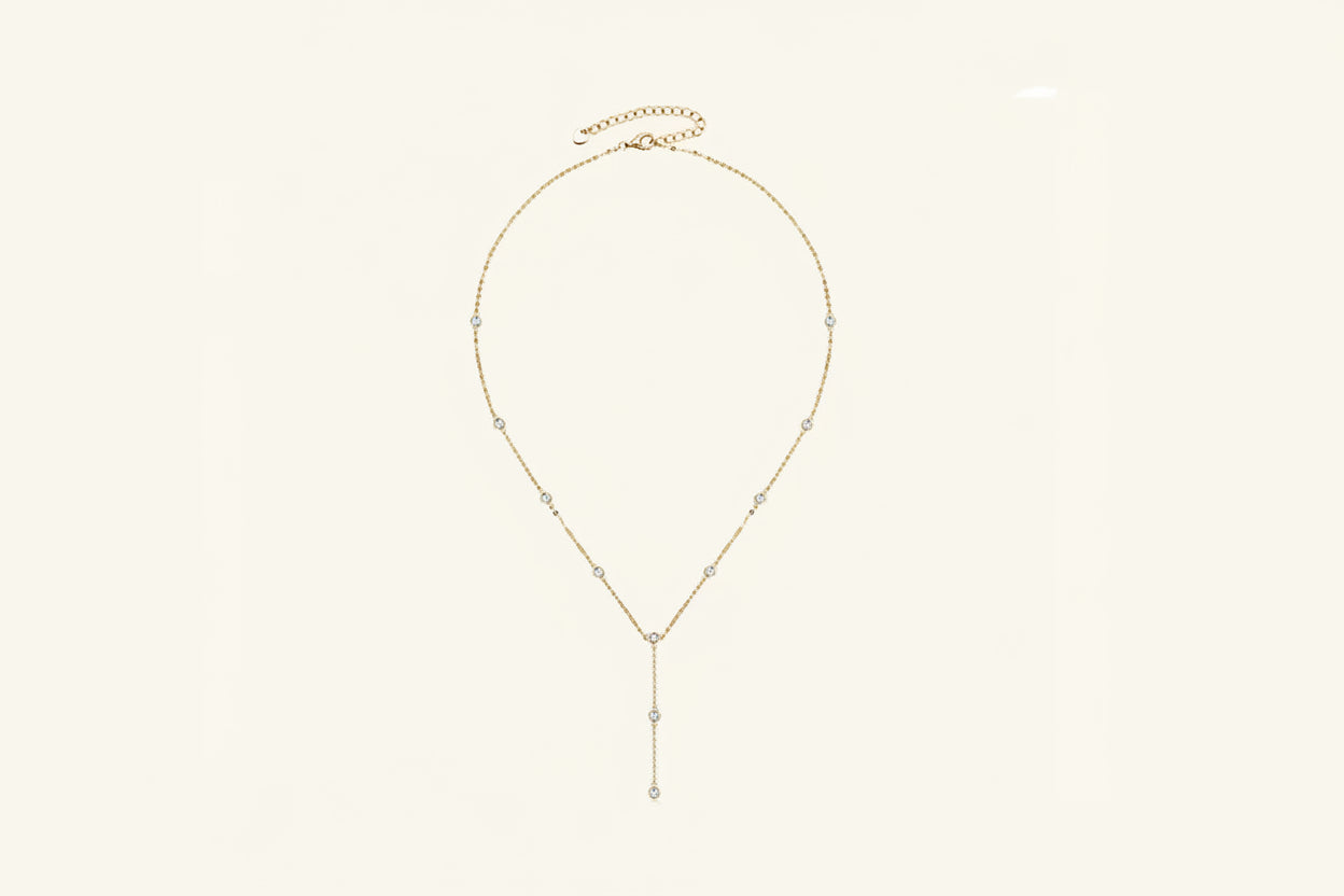 A 1.1 carat D-VVS1 moissanite pendant on an 18K gold-plated 925 sterling silver chain.