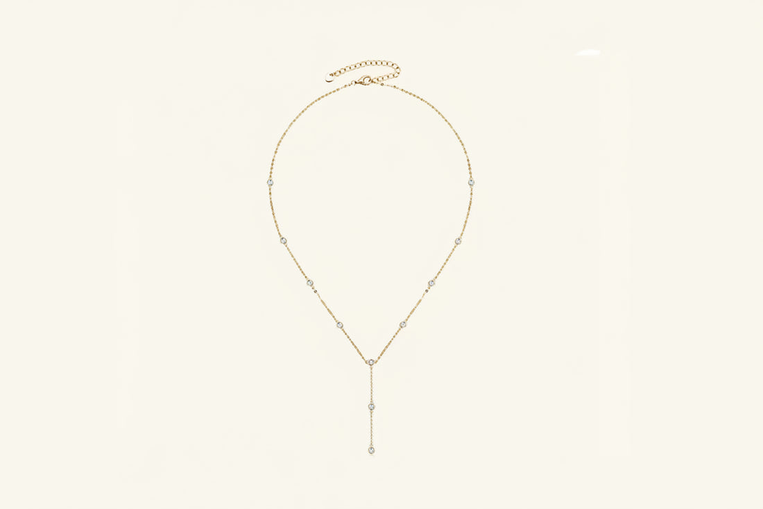 A 1.1 carat D-VVS1 moissanite pendant on an 18K gold-plated 925 sterling silver chain.