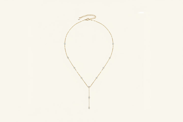 A 1.1 carat D-VVS1 moissanite pendant on an 18K gold-plated 925 sterling silver chain.