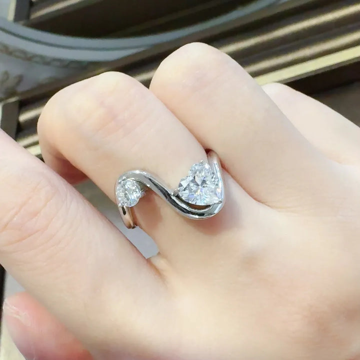 1.3 carat moissanite irregular shape ring in a high-polish 925 sterling silver setting.