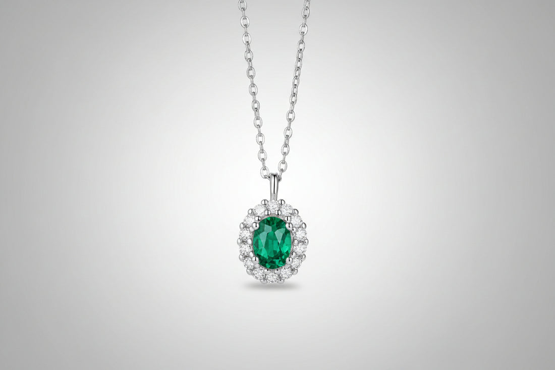 1.5 carat lab-grown emerald pendant with zircon accents on a platinum-plated 925 sterling silver chain.