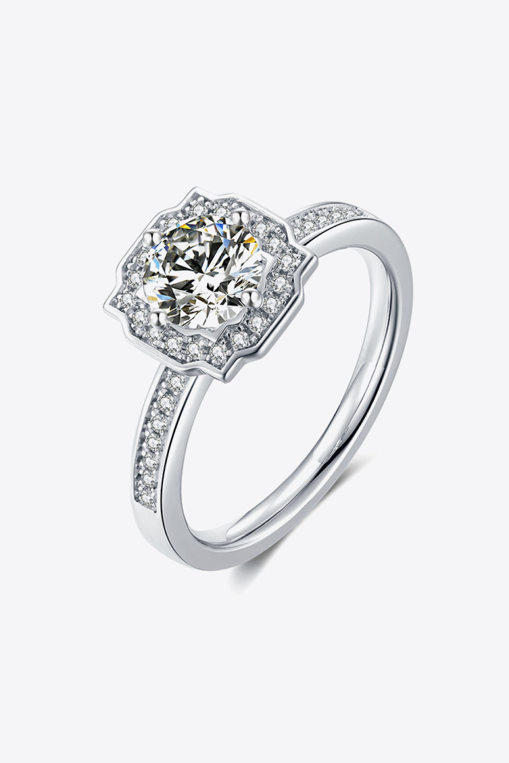 1-carat round cut moissanite solitaire ring in platinum-plated 925 sterling silver.