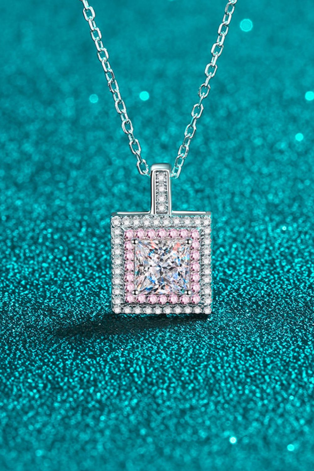 1-carat square cut moissanite pendant in platinum-plated 925 sterling silver.