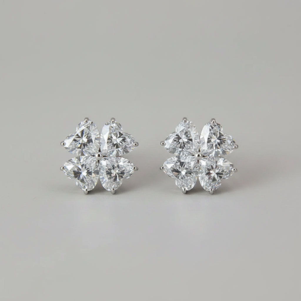 2.4 carat moissanite stud earrings in 925 sterling silver with gold and platinum plating