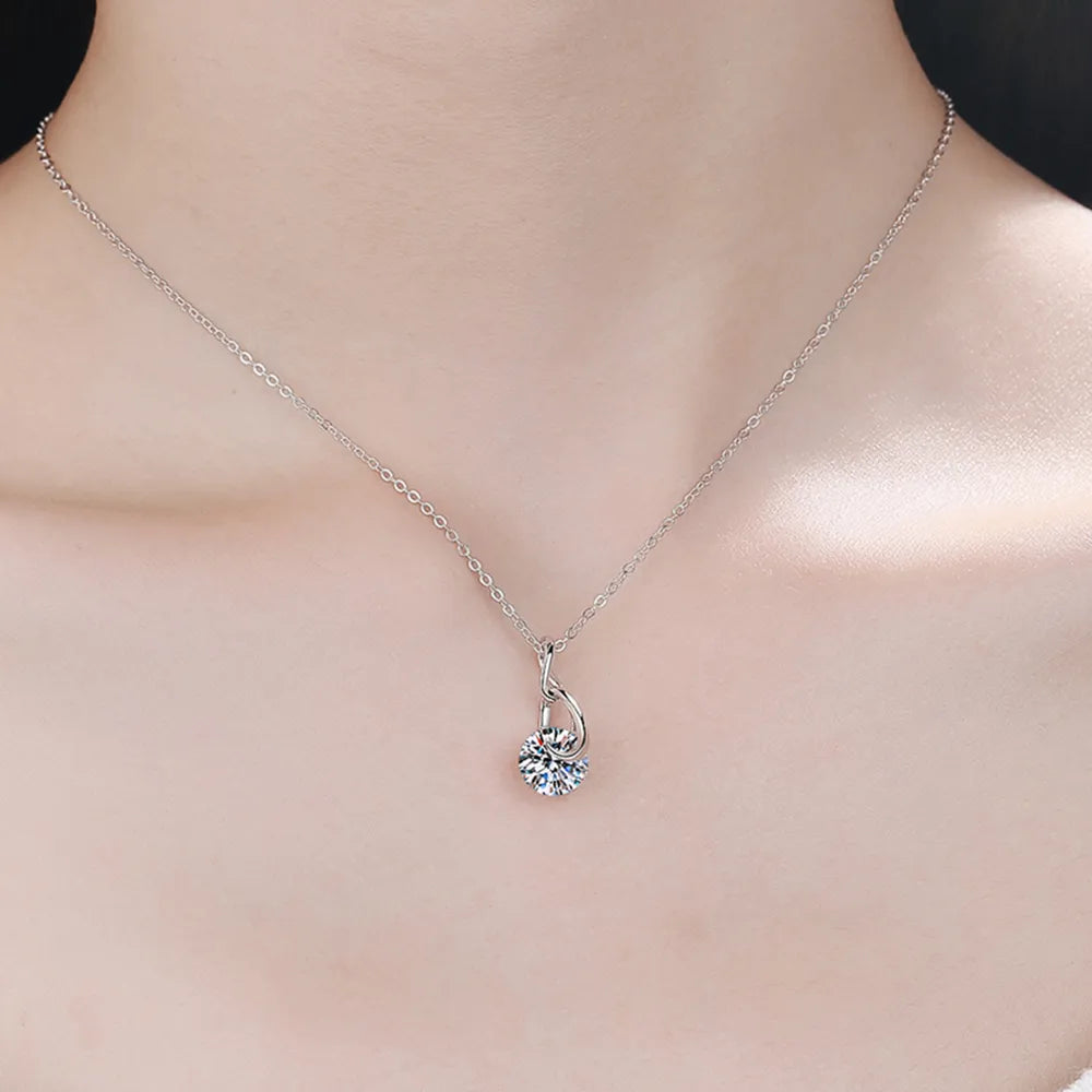 2 carat moissanite necklace in a high-polish 925 sterling silver solitaire setting.