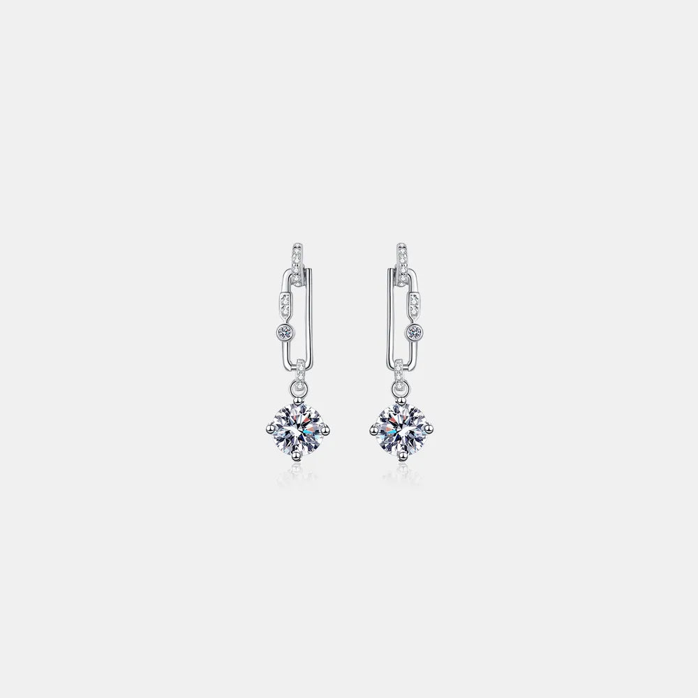 A pair of brilliant 2-carat total weight moissanite stud earrings in a 925 sterling silver setting.