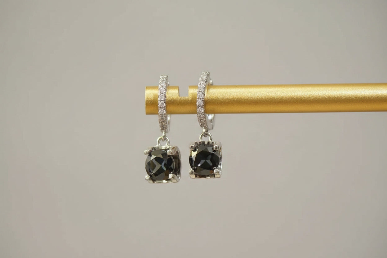 A pair of brilliant 2-carat total weight moissanite drop earrings in a platinum-plated 925 sterling silver setting