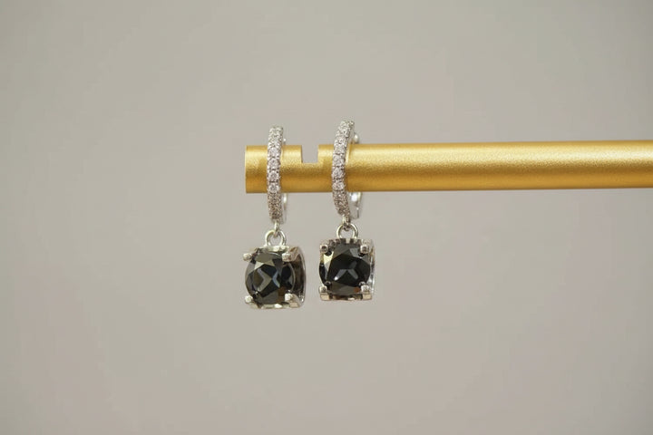 A pair of brilliant 2-carat total weight moissanite drop earrings in a platinum-plated 925 sterling silver setting