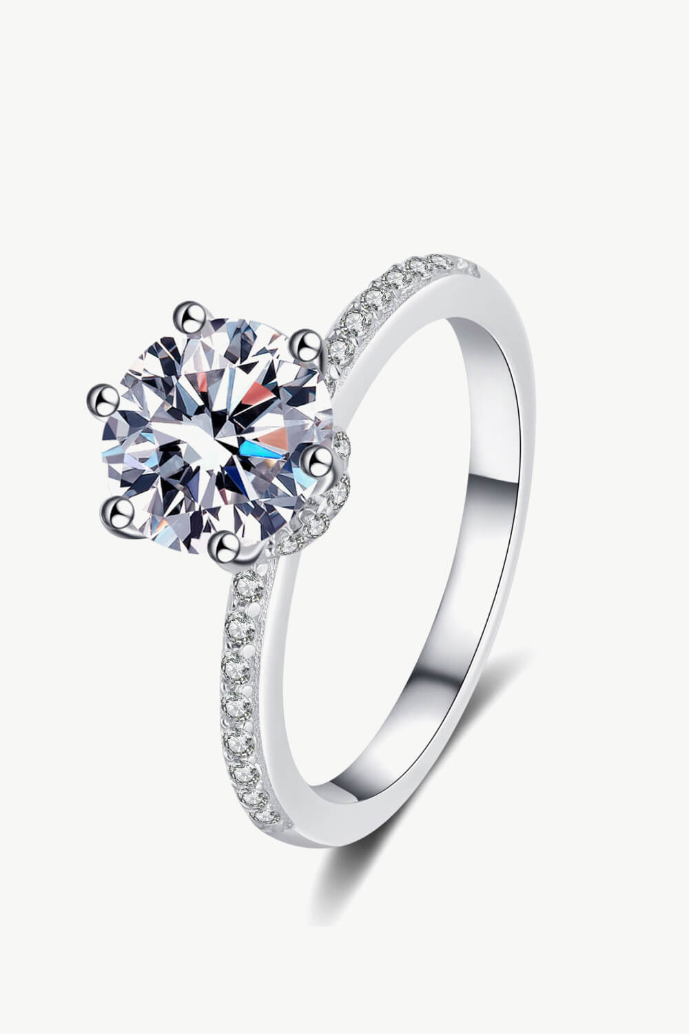 2-carat round cut moissanite solitaire ring in rhodium-plated 925 sterling silver.