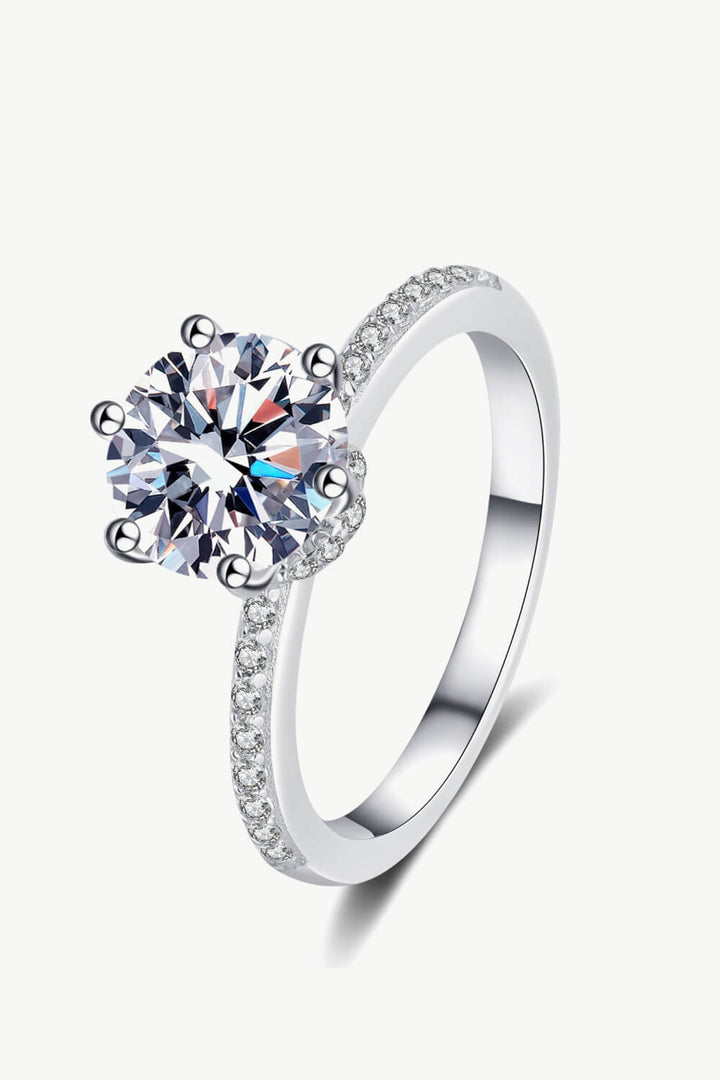 2-carat round cut moissanite solitaire ring in rhodium-plated 925 sterling silver.