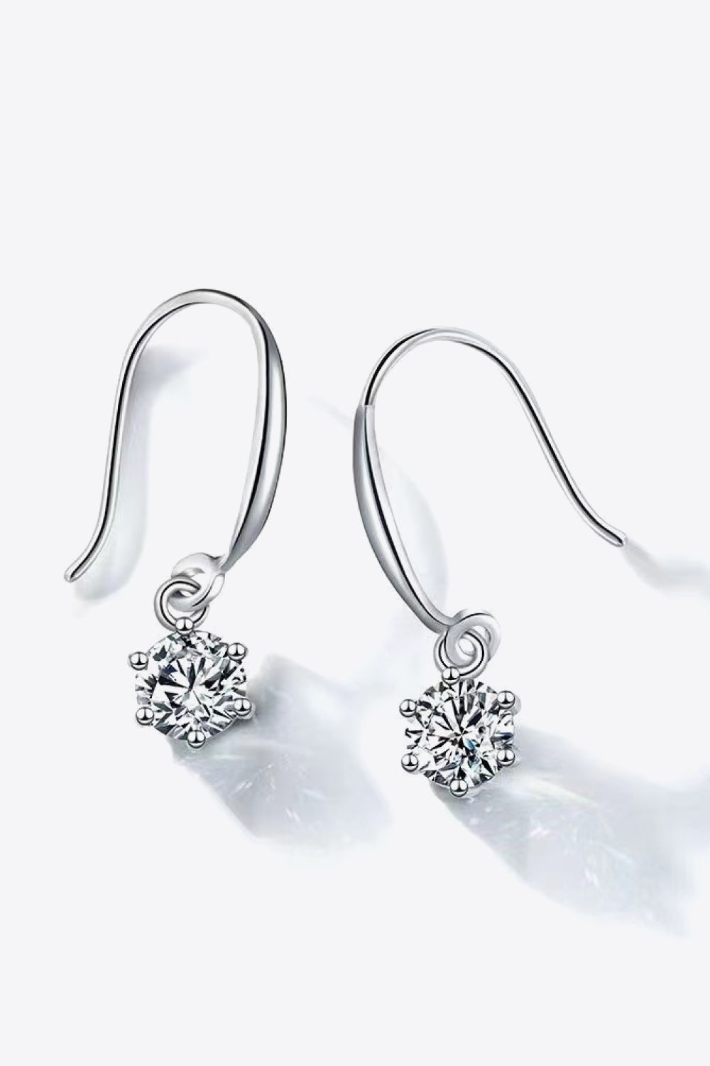 2-carat total moissanite 6-prong drop earrings in platinum-plated silver.
