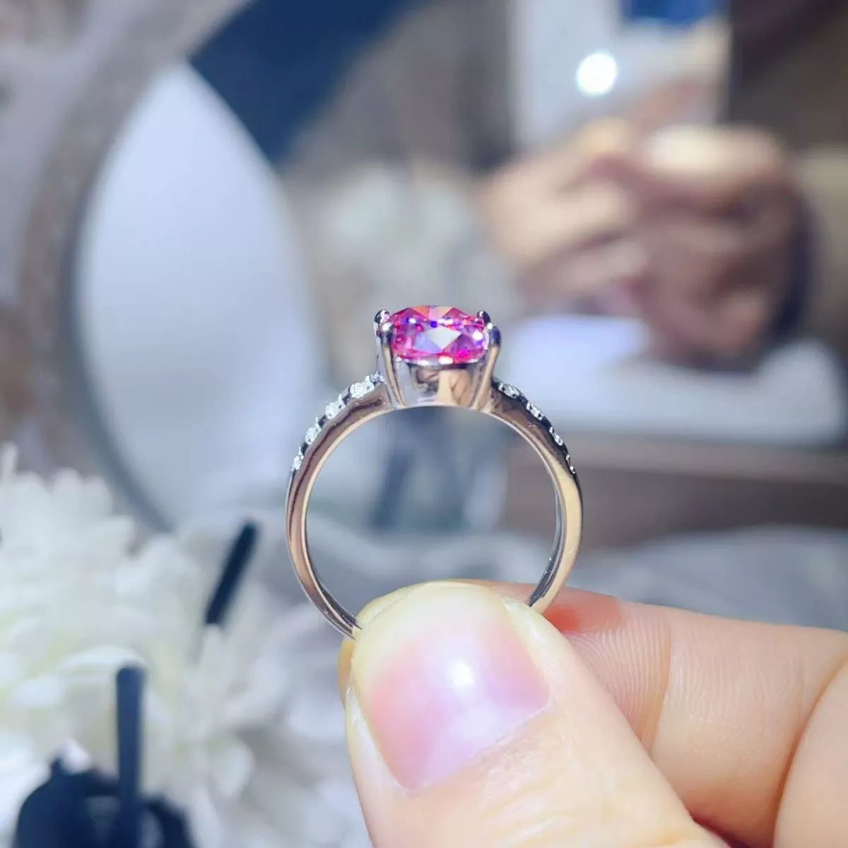 3-carat oval cut moissanite solitaire ring in platinum-plated 925 sterling silver.