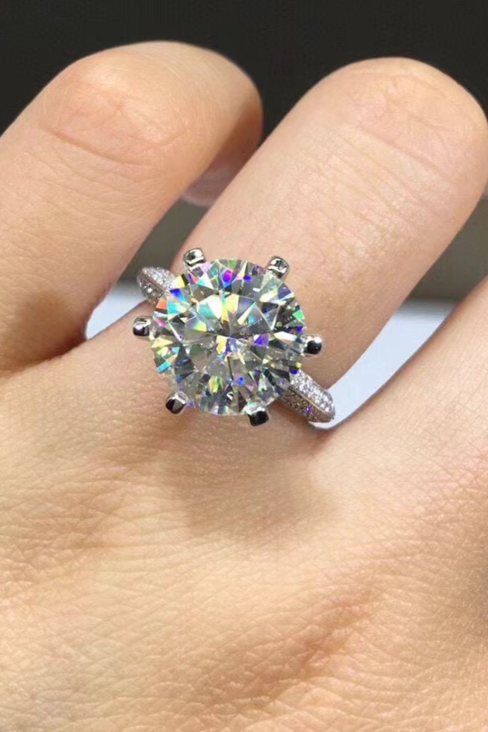 5-carat round cut moissanite solitaire ring in a geometric 6-prong 925 silver setting