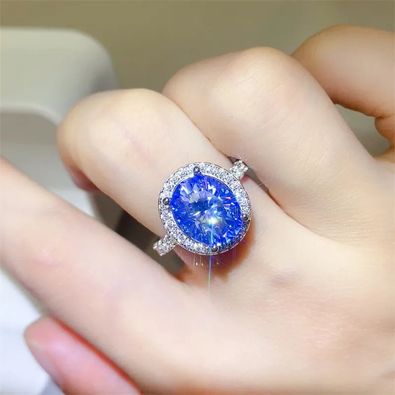 Brilliant 5ct moissanite ring showing shimmering zircon accent stones on the band.