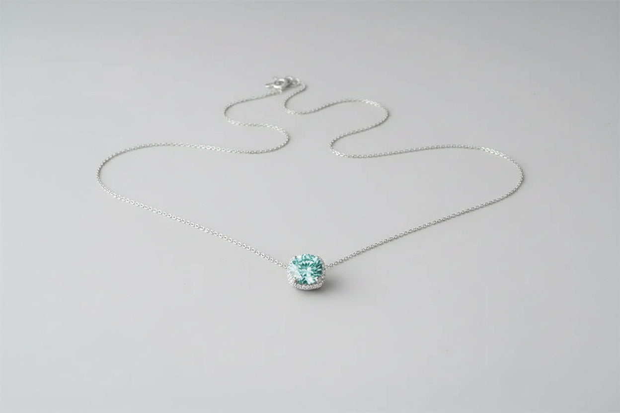 A brilliant 5-carat moissanite pendant on a platinum-plated 925 sterling silver chain.