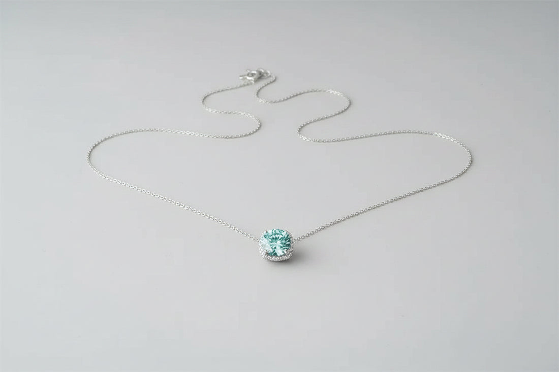 A brilliant 5-carat moissanite pendant on a platinum-plated 925 sterling silver chain.
