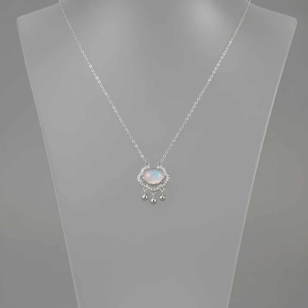 Auspicious lock pendant necklace in 925 sterling silver with a green chalcedony stone.