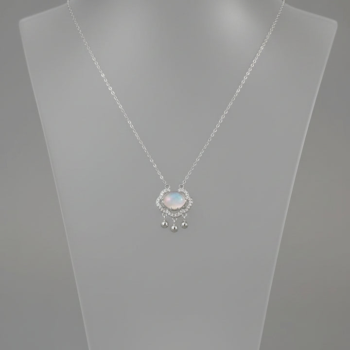 Auspicious lock pendant necklace in 925 sterling silver with a green chalcedony stone.