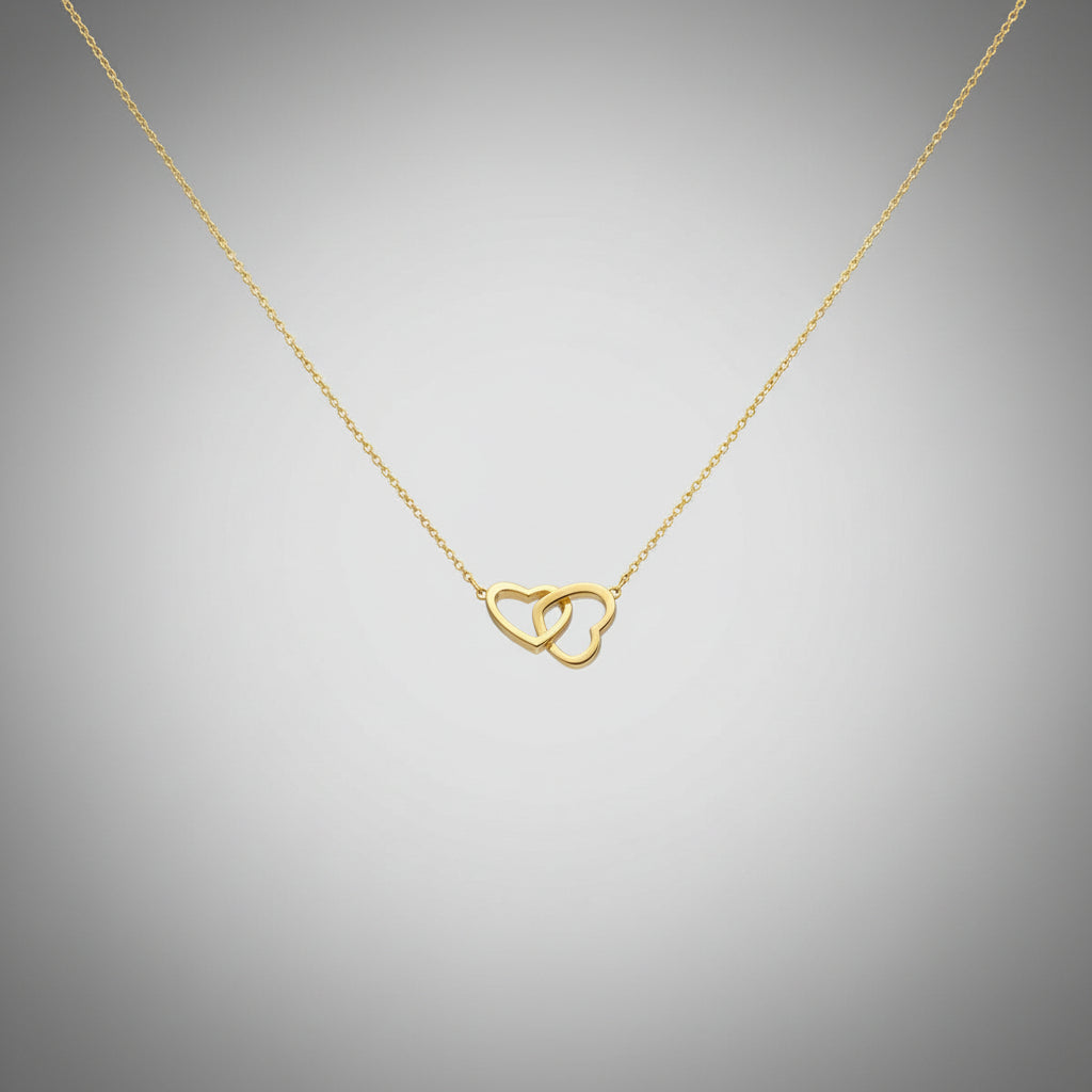 Interlocking heart pendant necklace in 18K gold plated 925 sterling silver.