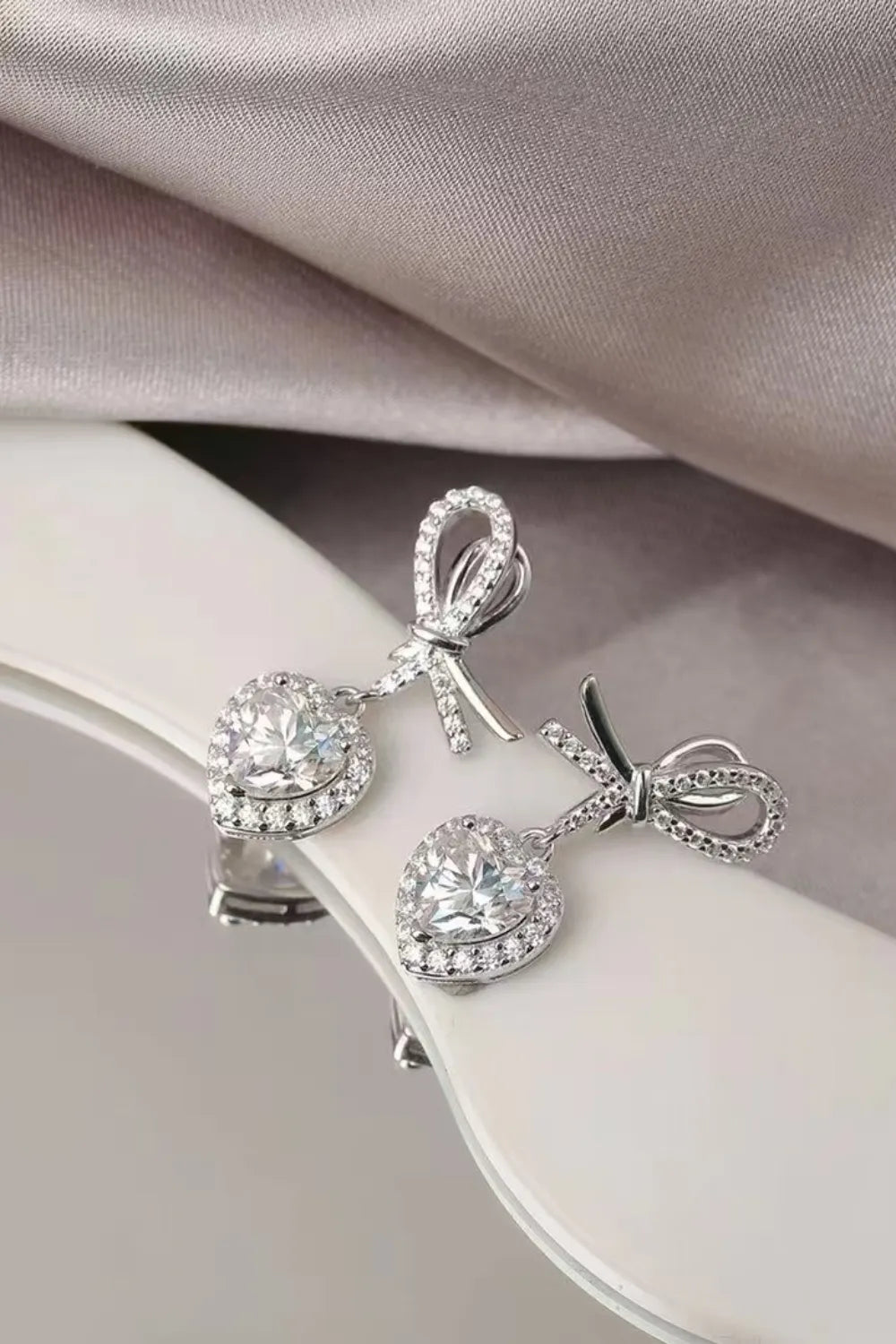 2ct heart-shaped moissanite stud earrings in platinum-plated 925 sterling silver for daily wear