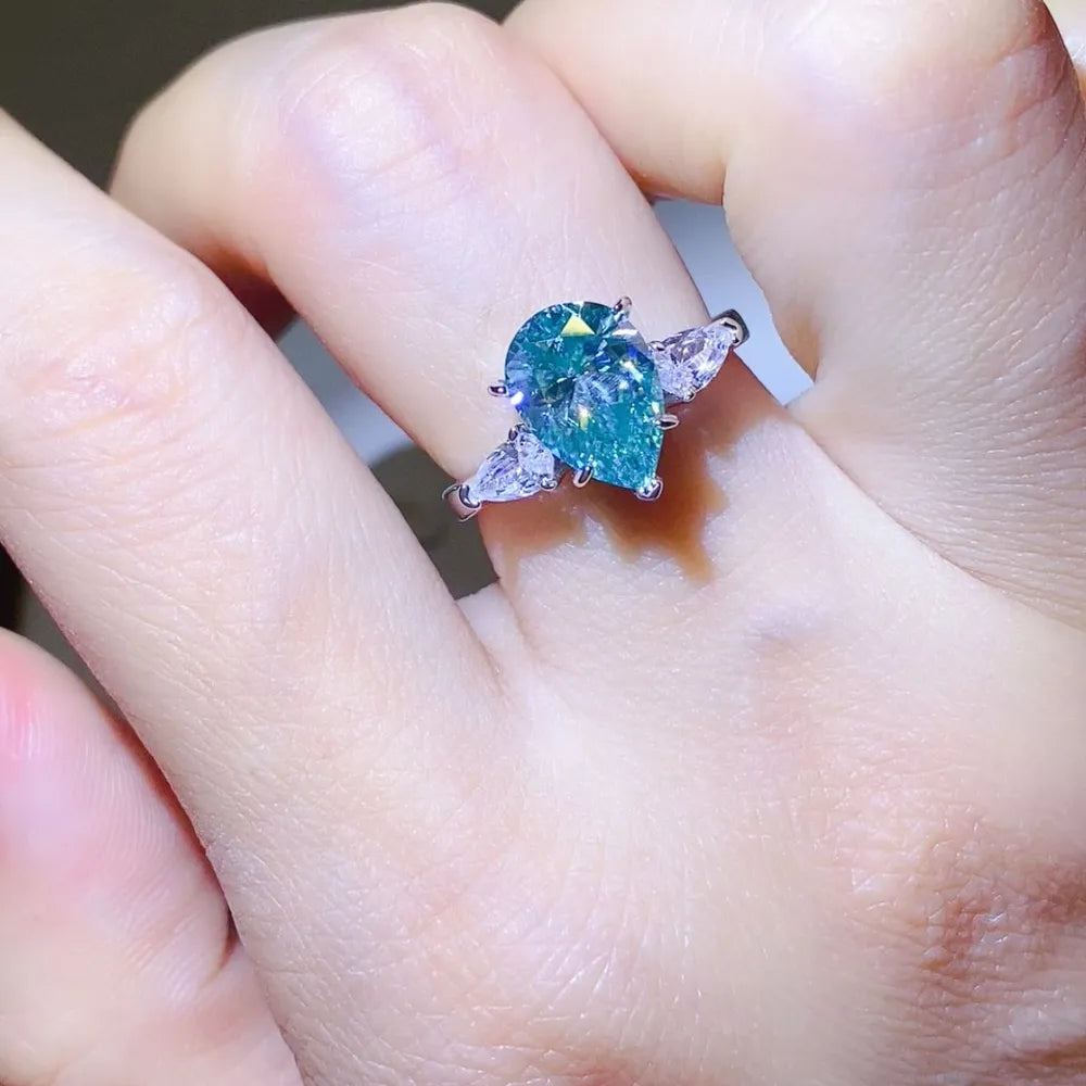 2-carat round cut moissanite solitaire ring in platinum-plated 925 sterling silver.